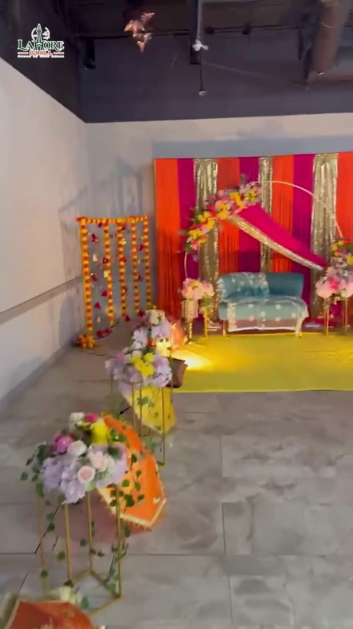 Video tour of the banquet hall and a colorful mehndi stage with floral decor